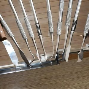 ชุดเครื่องมือผ่าตัดทางทันตกรรม 9 ชิ้น ด้ามจับแบบมีลาย  ทำจากสแตนเลสเกรด 1 สำหรับงานทันตกรรมจัดฟัน - Product Image 4