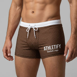 กางเกงว่ายน้ำแห้งเร็วแบบกำหนดเองสำหรับผู้ชาย พร้อมโลโก้ Athletify ปรับแต่งได้ตามต้องการ ป้องกันแสงแดด UPF50+ ระบายอากาศได้ดี เป็นมิตรกับสิ่งแวดล้อม เหมาะสำหรับฤดูร้อน - Product Image 1