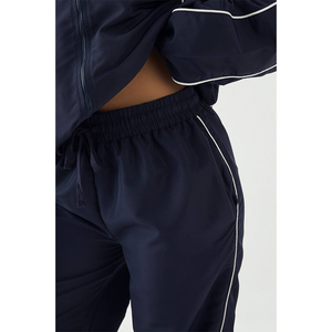 Ensemble de survêtement 2 pièces 2026 pour femme, coupe-vent en nylon froissé, doublure filet, passepoil, veste zippée de sport et football, et joggers amples - Product Image 3