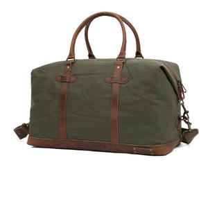 Premium Vintage Canvas Travel Duffle Bag Large Capacity Weekender with Genuine Leather Trim and Brass Hardware - Product Image 4