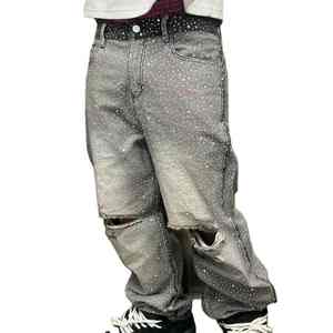 Ajoutez une touche de brillance à votre look du soir avec un pantalon en jean orné de strass de qualité supérieure. - Product Image 1