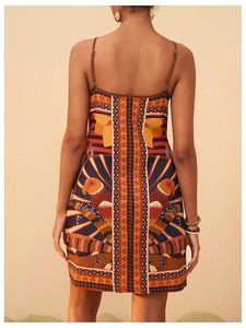 Vestido corto estilo bohemio con estampado tropical para mujer, sin mangas, con cuello en V y lazo. - Product Image 3