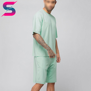 Conjunto de camiseta y pantalones cortos de punto casual, transpirable, cómodo, para verano, en color verde menta sólido, para hombre. - Product Image 6