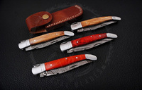 Couteau pliant de survie Laguiole - Acier au carbone et manche en os, bord partiellement dentelé, design compact pour le camping et la randonnée