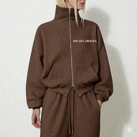 Ensemble de survêtement unisexe douillet et personnalisable avec fermeture éclair intégrale, col montant, coupe classique, poches latérales imprimées, idéal pour l'hiver et les tenues décontractées