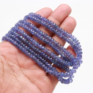AAA + perles de rondelle à facettes en tanzanite de qualité 3-5mm perles de tanzanite brin de tanzanite à facettes naturelles - Product Image 1