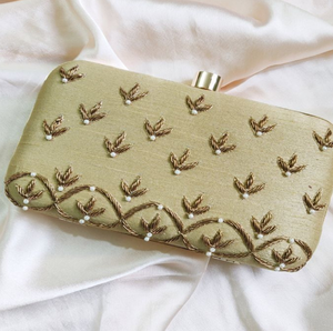 Shimmering seed pearls and crystals adorn this elegant <b>bridal</b> clutch. Available at wholesale prices <b>for</b> your boutique collection - Product Image 1