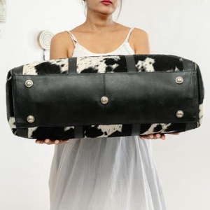 กระเป๋าเดินทางหนังวัววินเทจสำหรับผู้ชายและผู้หญิง - Product Image 4
