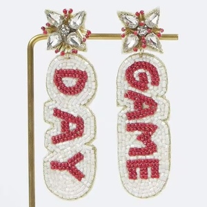 Beaded <b>Witch</b> Hat Legs Earrings Beads Embellished Hand Crafted Parrot Stud Earrings from the brand BaubleBar - Product Image 3