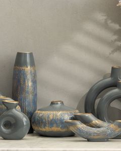 Vase en métal élégant, fabriqué avec une finition haut de gamme pour ajouter une touche moderne et luxueuse à toute décoration intérieure. - Product Image 4