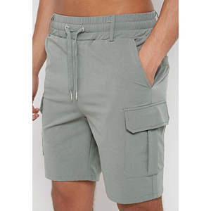 บริการขายส่ง OEM กางเกงขาสั้นชายหาดฤดูร้อนสำหรับผู้ชายรุ่นใหม่ แบบสั่งทำพิเศษ ผ้าโพลีเอสเตอร์ 88% สไตล์เซิร์ฟ ลายเรียบ - Product Image 2