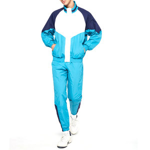 Nouvel ensemble de survêtements OEM pour hommes, coupe-vent 2 pièces en nylon 100% imprimé, style streetwear uni avec patchwork personnalisé et capuche - Product Image 1