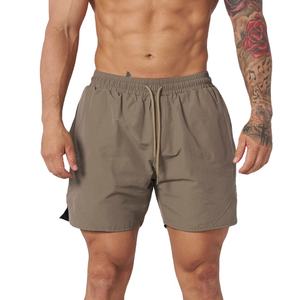 Pantalones cortos de gimnasio para hombre con logotipo personalizado 2025, estilo callejero, patrón sólido, joggers de poliéster ligero, pantalones cortos para correr de verano de 5 pulgadas - Product Image 3