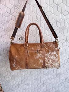 กระเป๋าเดินทางหนังวัวแท้ลายขนสัตว์ ดีไซน์เฉพาะตัว ทำมือ ใช้ได้หลากหลาย  กระเป๋าเดินทางหนังวัวแท้ขนสัตว์  สำหรับทุกเพศ - Product Image 4