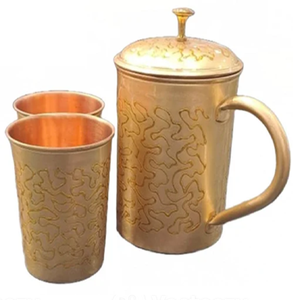 Splendid ribbed <b>copper</b> jug with a brilliant reflective shine and sturdy gold tone <b>handle</b>. Available at wholesale price. - Product Image 3