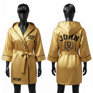 TAISON SPORTS Robe de boxe en satin premium 300 GSM personnalisée avec capuche dorée, passepoil noir, ceinture et logo brodé, anti-humidité - Product Image 1
