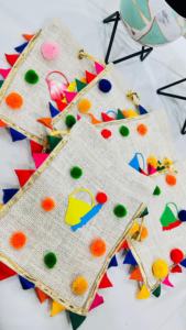 กระเป๋าโฮลีสีสันสดใสสำหรับงานเฉลิมฉลองสีสัน งานฝีมืออินเดียแบบดั้งเดิม ทำจากผ้าปอกระเจา กระเป๋าโฮลีงานฝีมือสำหรับงานเทศกาล - Product Image 2