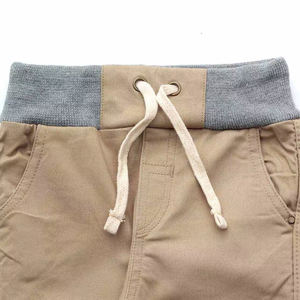 Pantalones cargo impermeables personalizados para niños, pantalones jogger cargo, pantalones de sarga elástica con bolsillos, puños y cordón ajustable para niños - Product Image 4