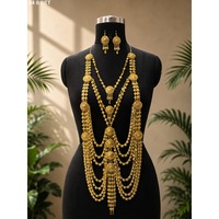 Parure de bijoux exquise pour femme, style bohème, en cuivre plaqué or, pour mariage, fiançailles et fête, comprenant collier et boucles d'oreilles à pampilles en filigrane doré