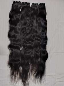 Extensions de cheveux humains longs et ondulés de haute qualité pour ajouter de la longueur et de la mouvement, provenant d'un fournisseur indien. - Product Image 1