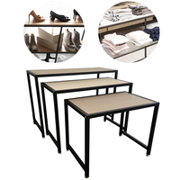 Tables de présentation de vêtements autoportantes modernes en bois noir, 3 emplacements, revêtement poudré, emballées en carton, montage facile pour la vente au détail