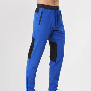 Pantalon de jogging pour homme bleu marine, taille élastique, poches latérales zippées, bas de pantalon côtelé, pantalon sportif - Product Image 3