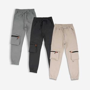 Pantalons cargo durables pour garçons avec plusieurs poches, coupe confortable et fabrication sur mesure disponible pour la vente en gros de pantalons pour hommes - Product Image 1