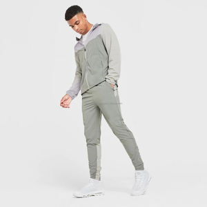 กางเกงผู้ชายน้ำหนักเบาสำหรับวิ่งจ๊อกกิ้งผ้าฝ้ายโพลีเอสเตอร์กันไฟฟ้าสถิตย์สำหรับผู้ใหญ่ดีไซน์ตามสั่ง - Product Image 5