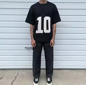 Camiseta deportiva extragrande de malla para hombre, estilo streetwear, corte holgado, tipo jersey de fútbol americano, fabricada a medida. - Product Image 1