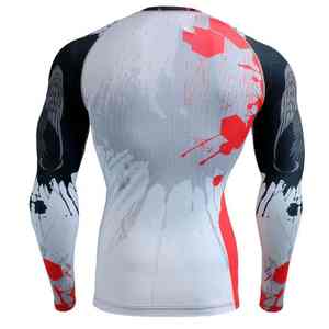 Equipo de lucha resistente y duradero diseñado para sesiones de grappling intensas con una camiseta de compresión con estampado creativo por sublimación. - Product Image 2