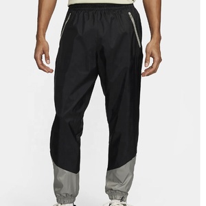 กางเกงจ็อกเกอร์ไนลอนกันน้ำแบบสั่งทำพิเศษสำหรับผู้ชาย กางเกงออกกำลังกายกลางแจ้งกันลมสองสี ซิปขายส่ง กางเกงขายาวผู้ชาย - Product Image 1