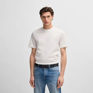 Camiseta Blanca Premium para Hombre, 100% Algodón Tejido, Corte Holgado y Cómodo, para Uso Diario y Formal, Estilo Moderno - Product Image 1