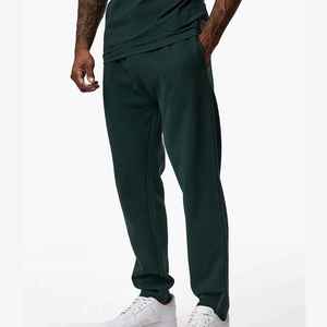 Pantalon de survêtement vert foncé pour homme, taille élastique, cordon de serrage, poches latérales, décontracté, pour l'automne, en coton tricoté mi-lourd - Product Image 1