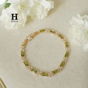 18K Gold Green Gemstone Tennis <b>Bracelet</b> with Floral Diamond Accents – Elegant Womens Jewelry - Product Image 1