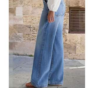 Nouveau Jean Femme Taille Mi-Haute Coupe Large en Denim Délavé avec Détails de Couture, Style Décontracté Urbain, Vente en Gros Personnalisée - Product Image 6