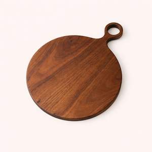 Planche à découper ronde élégante avec poignée ergonomique, surface lisse et adaptée aux couteaux, parfaite pour couper, servir et décorer la cuisine - Product Image 1