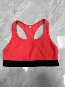 Sujetador Deportivo Ligero de Alta Calidad, Cómodo, Talla Grande, Sexy, Sin Costuras, para Yoga, con Logotipo Frontal, Venta al Por Mayor - Product Image 1