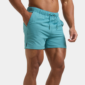 Shorts de bain mi-longs pour homme, légers, en spandex et polyester, unis, imperméables, avec taille élastique et poches latérales - Product Image 1