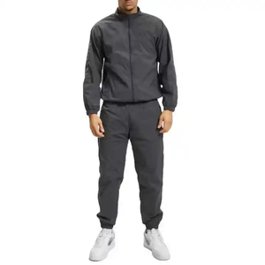 Ensemble de survêtement gris foncé en polyester pour homme – Veste zippée et pantalon de jogging – Tenue décontractée d'automne – Couleur unie – Conception respirante - Product Image 1