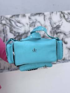 กระเป๋าเป้หนังวัวแท้รุ่นใหม่ล่าสุด สีเทอร์ควอยซ์ สำหรับทุกเพศ ดีไซน์สวยงาม ทำมือ ใช้ได้หลากหลาย - Product Image 4