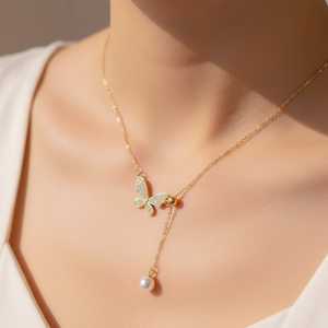 Colgante de mariposa chapado en oro y plata Hallmark, joyería casual de latón con diamante ovalado engastado en bisel - Product Image 1
