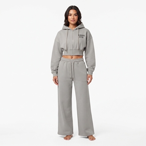 Conjunto de dos piezas de ropa casual de alta calidad para mujer al por mayor: Top corto con cremallera completa y sudadera con hombros caídos, y pantalón jogger de pierna ancha. - Product Image 5