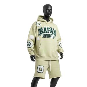 ชุดเซ็ตฮู้ดดี้และกางเกงขาสั้นผ้าฝ้ายฟลีซพรีเมียม 320 GSM สีเขียวเซจ แต่งแพทช์เชนีล ปักโลโก้ตามสั่ง - Product Image 4