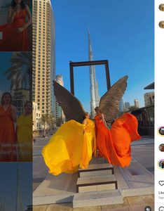 Robe de soirée fluide et vibrante pour la photographie à Dubaï, en satin jaune et orange, col licou, dos nu - Product Image 2