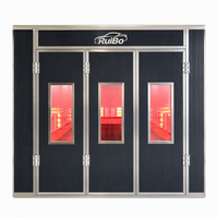 Cabine de peinture automobile RuiBo gris foncé avec portes pliantes, lampes de séchage infrarouges rouges en fonctionnement, panneaux isolants et charnières robustes