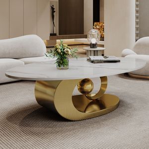 Table basse sculpturale en acier inoxydable avec plateau élégant en marbre - Product Image 1