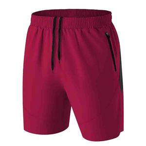 Shorts de sport pour homme, vintage, à séchage rapide, anti-plis, tissés, 100% polyester, couleur unie, taille élastique, poche zippée, décontractés, pour l'entraînement - Product Image 1