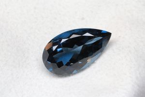 พลอยโทแพซลอนดอนแท้ - รูปทรงลูกแพร์ขนาด 16x12 มม. เจียระไนเหลี่ยม สีน้ำเงินเข้ม สำหรับทำเครื่องประดับ - Product Image 6