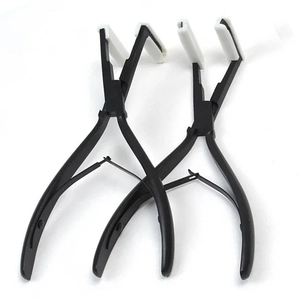 Pince à extensions capillaires robuste en métal noir mat avec double ressort, outil d'application de ruban adhésif pour l'installation et le retrait - Product Image 1