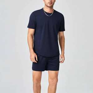 ชุดเสื้อยืดคอกลมสีกรมท่าและกางเกงขาสั้นสำหรับผู้ชาย ชุดลำลองใส่สบายระบายอากาศได้ดี เหมาะสำหรับฤดูร้อน ผ้าฝ้ายถักสีพื้น - Product Image 6